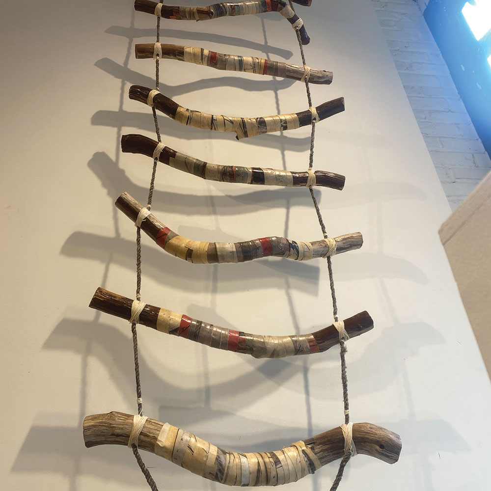 The gallery window features a new sculpture, included in 