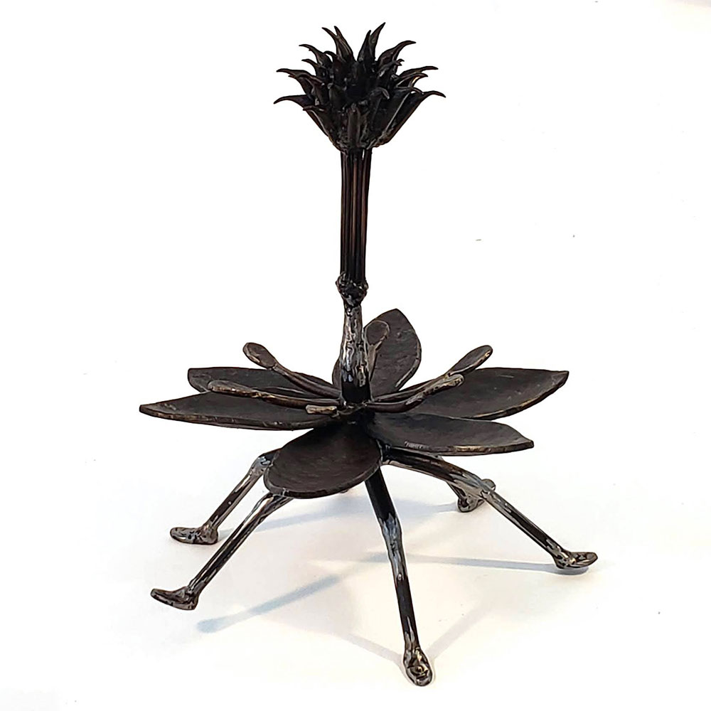On view in the gallery is a selection of fanciful steel sculpture created by Torin Porter. His work complements the